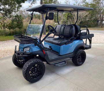 Blue and black golf cart