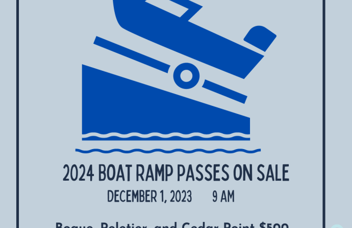 boat backing into the water.  Info about boat ramp pass sales.